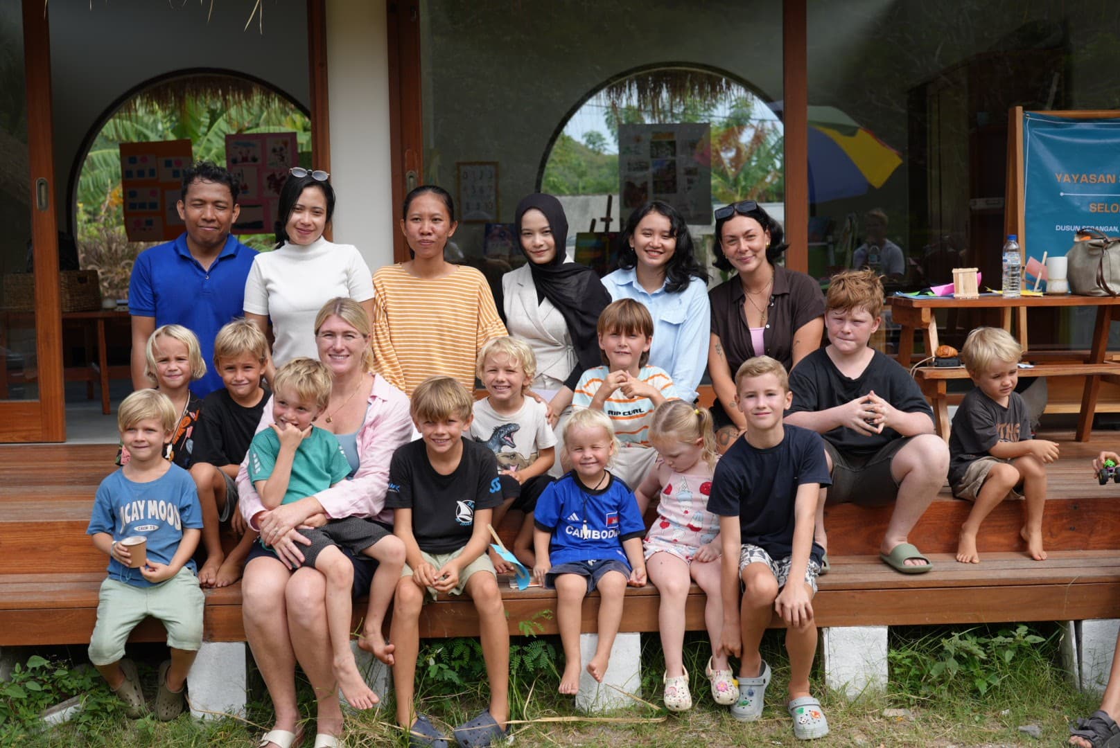 Teachers, staff, and students gathered together on campus at Selong Bay School
