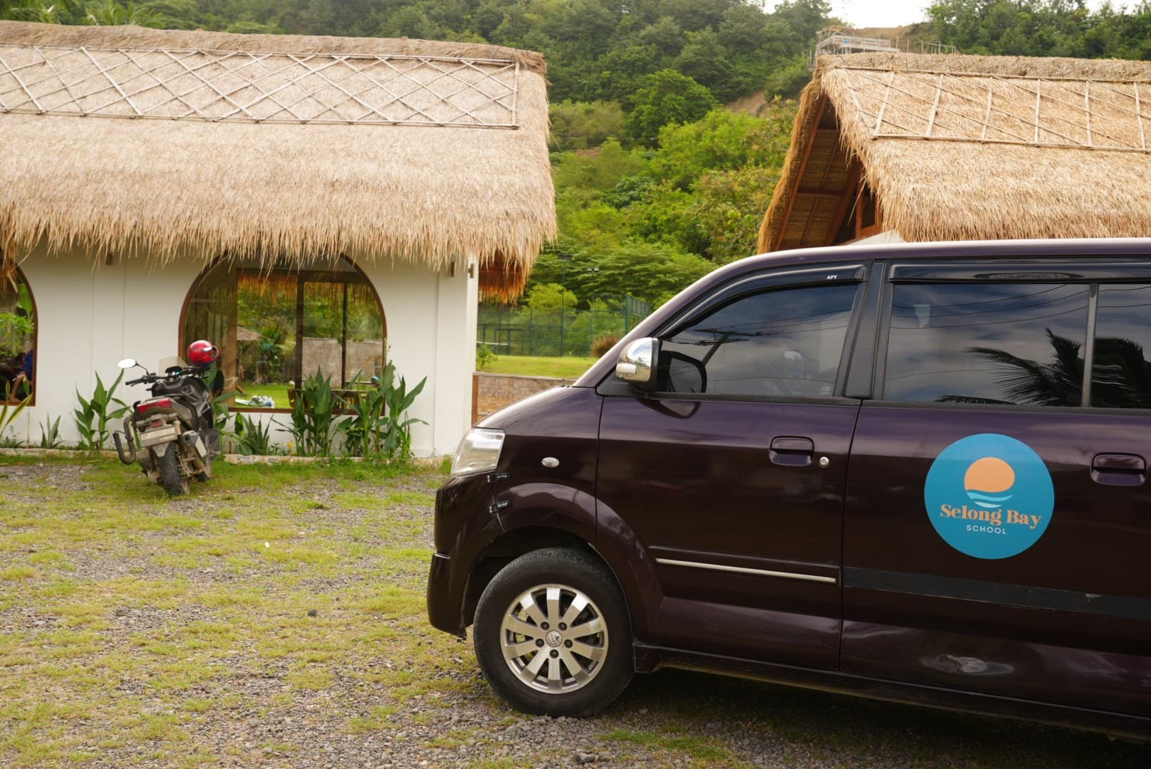 The free Selong Bay School shuttle van